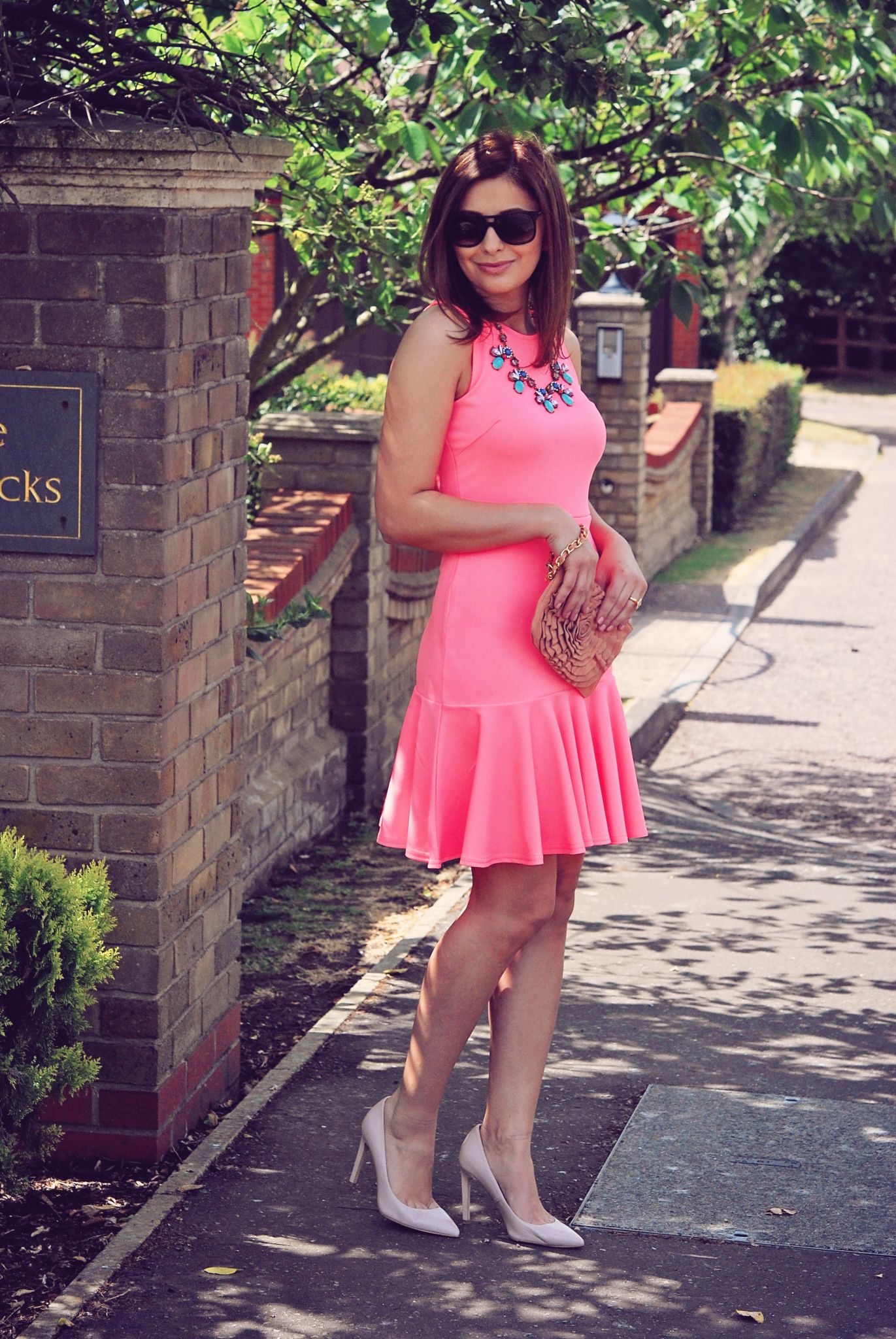 Eileen Cuisine|Bright pink, wearing Quiz dress