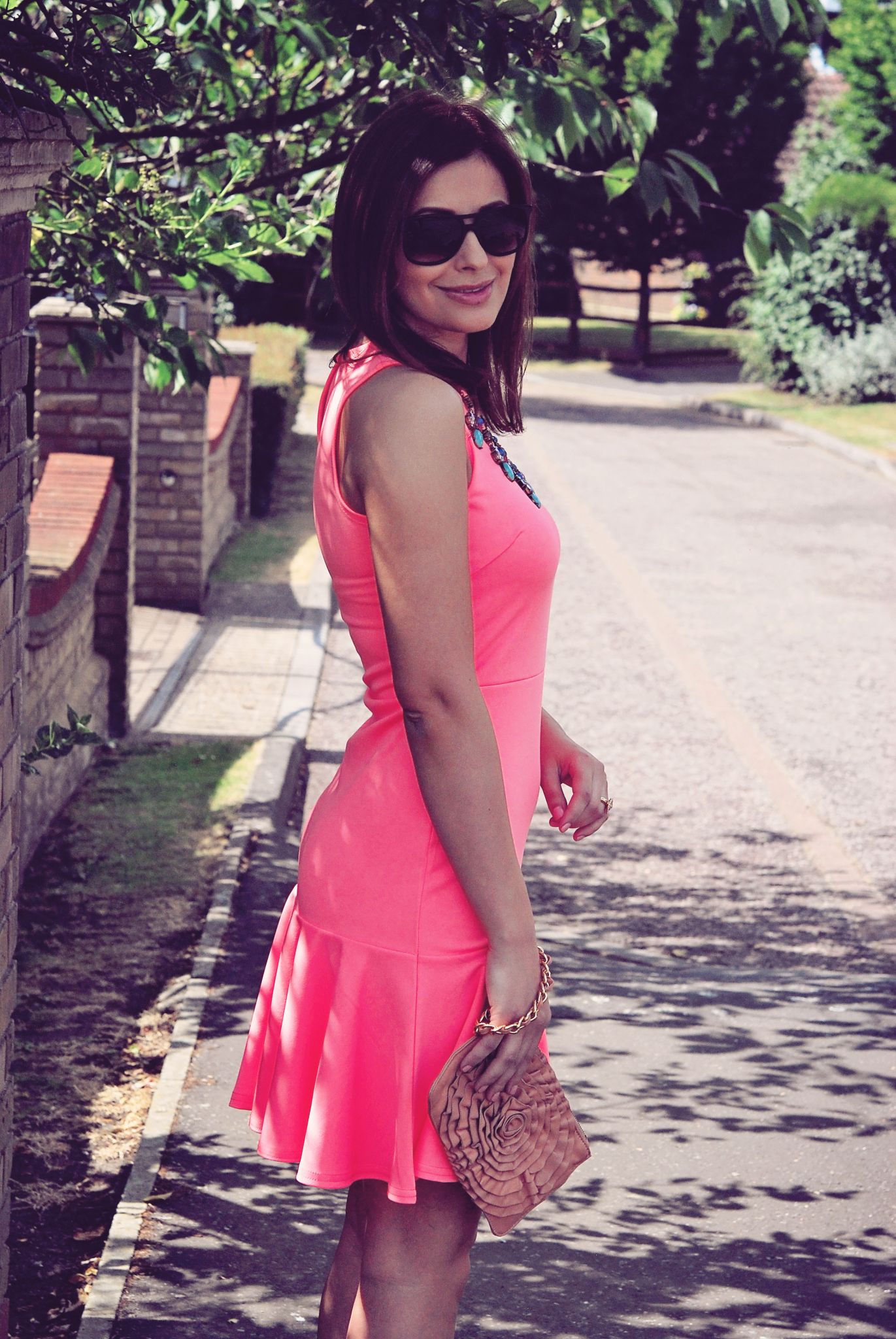 Eileen Cuisine|Bright pink, wearing Quiz dress