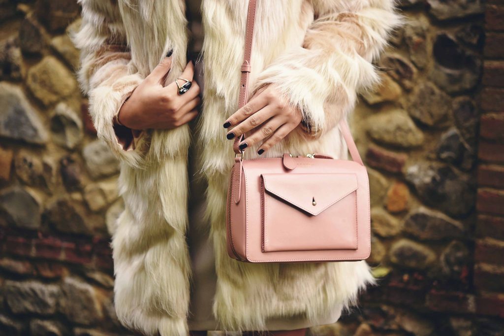 fur coat and bodycon dress